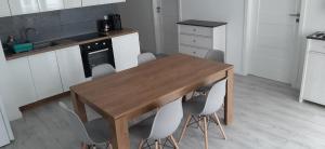 Kuchyň nebo kuchyňský kout v ubytování Apartament Thomas