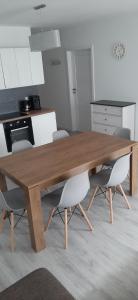 Kuchyň nebo kuchyňský kout v ubytování Apartament Thomas