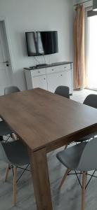 TV a/nebo společenská místnost v ubytování Apartament Thomas
