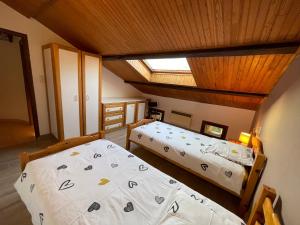 Postel nebo postele na pokoji v ubytování Le Gîte De Babeth