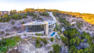 an aerial view of a building on a hill at La Vida in Payton