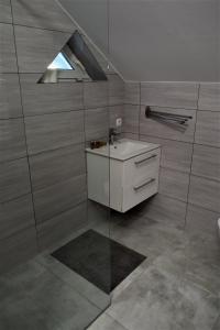 Koupelna v ubytování Rewianka Apartamenty przy samej plaży