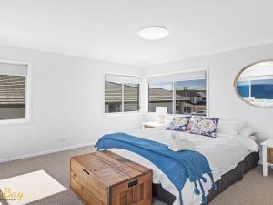 Ένα ή περισσότερα κρεβάτια σε δωμάτιο στο Elanora Ocean St No 8