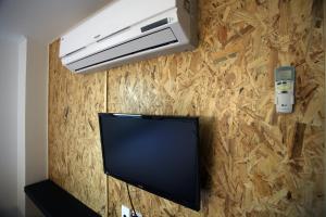 TV a/nebo společenská místnost v ubytování KSTAR METRO Hotel