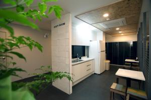 Kuchyň nebo kuchyňský kout v ubytování KSTAR METRO Hotel