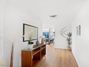 Μια τηλεόραση ή/και κέντρο ψυχαγωγίας στο Breakwater Apartment 402 +18 φωτογραφίες