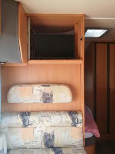 Ένα ή περισσότερα κρεβάτια σε δωμάτιο στο "Campingplatz Altjessen 57"