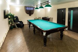a room with a pool table in a room with at Villa LUI-JO in Krasnodar