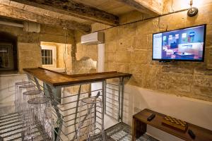 TV a/nebo společenská místnost v ubytování No 68 in Valletta