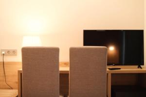 TV a/nebo společenská místnost v ubytování Hotel Bulevard