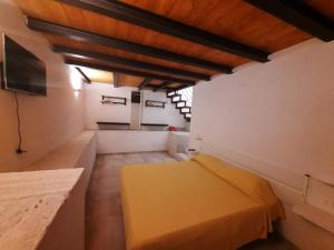Postel nebo postele na pokoji v ubytování B&B Teta Vieste