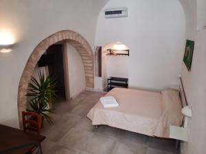 Postel nebo postele na pokoji v ubytování B&B Teta Vieste