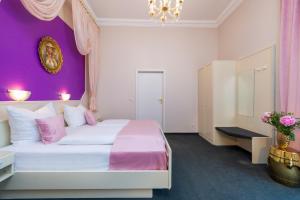 Postel nebo postele na pokoji v ubytování W22 Hotel am Kurfürstendamm