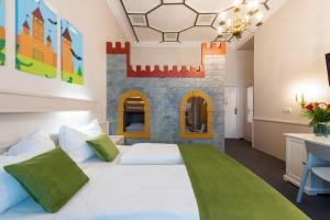 Postel nebo postele na pokoji v ubytování W22 Hotel am Kurfürstendamm