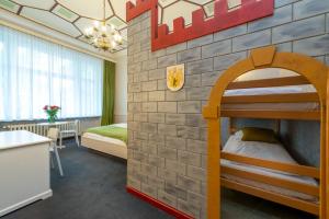 Postel nebo postele na pokoji v ubytování W22 Hotel am Kurfürstendamm