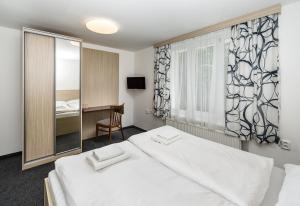 Postel nebo postele na pokoji v ubytování Pension Trautenberk