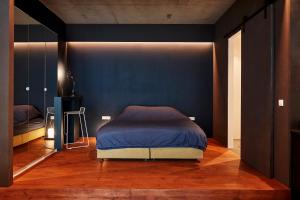 Кровать или кровати в номере New beautiful design studio in Amsterdam West