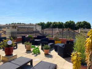 Balkón nebo terasa v ubytování Hôtel Porte de Camargue - Les Quais d'Arles