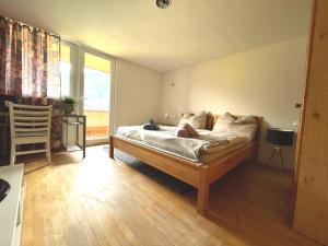 Кровать или кровати в номере Rosa - Huusa im Bregenzerwald