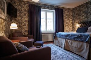 Postel nebo postele na pokoji v ubytování Boutique Hotel Yöpuu + 37 fotografií