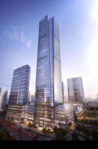un groupe de gratte-ciel haut dans une ville dans l'établissement Crowne Plaza Hangzhou Science City, an IHG Hotel, à Hangzhou