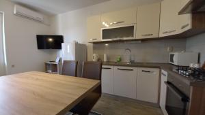 Kuchyň nebo kuchyňský kout v ubytování Apartman Martina