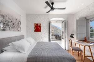 Posteľ alebo postele v izbe v ubytovaní ONOS RESIDENCE