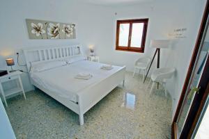 Postel nebo postele na pokoji v ubytování Suerte - sea view villa with private pool in Moraira