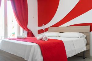 A bed or beds in a room at Terrazza Garibaldi