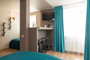 Kuchyň nebo kuchyňský kout v ubytování Kurshi Hotel & Spa