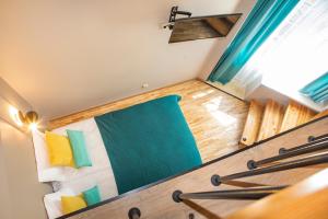 Postel nebo postele na pokoji v ubytování Kurshi Hotel & Spa