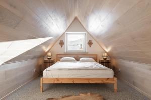 Posteľ alebo postele v izbe v ubytovaní Apartamenty Butorowy Zakopane + 37 fotografií