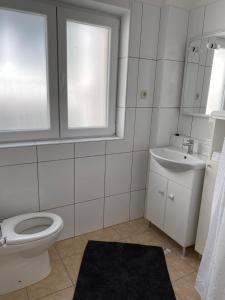Kúpeľňa v ubytovaní Villa Leo Beach Apartment