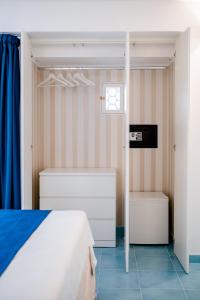 Postel nebo postele na pokoji v ubytování BeB Palazzo Mancini