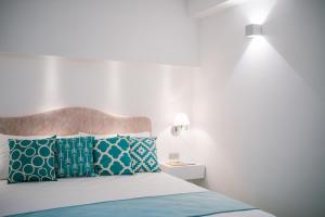 Postel nebo postele na pokoji v ubytování BeB Palazzo Mancini