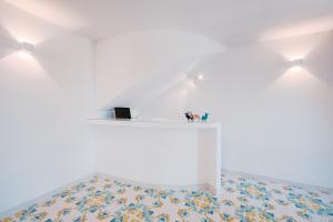 Postel nebo postele na pokoji v ubytování BeB Palazzo Mancini