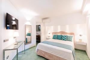Кровать или кровати в номере BeB Palazzo Mancini