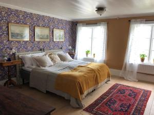 Postel nebo postele na pokoji v ubytování Träslottets B&B