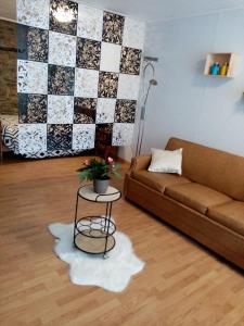 Posezení v ubytování Chez isa + 1 fotografie