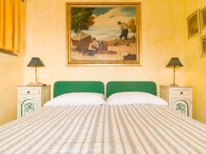 A bed or beds in a room at Agriturismo Natta Di Monte Tabor