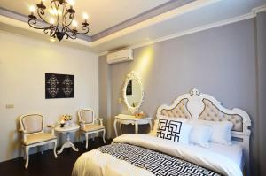 Postel nebo postele na pokoji v ubytování Yunju House + 37 fotografií
