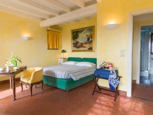 A bed or beds in a room at Agriturismo Natta Di Monte Tabor