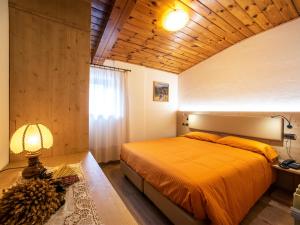 Voodi või voodid majutusasutuse Hotel Adriana toas