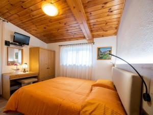 Voodi või voodid majutusasutuse Hotel Adriana toas