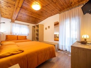Voodi või voodid majutusasutuse Hotel Adriana toas