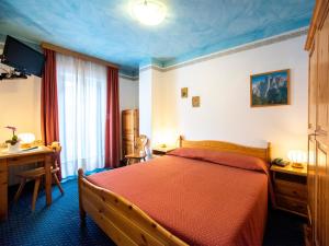 Voodi või voodid majutusasutuse Hotel Adriana toas
