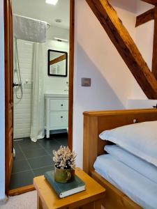 Postel nebo postele na pokoji v ubytování Casa Dávid Ferenc Ház