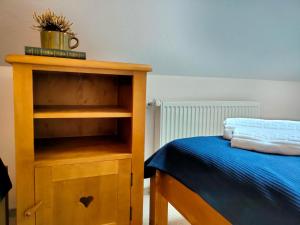 Postel nebo postele na pokoji v ubytování Casa Dávid Ferenc Ház