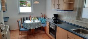 Kuchyň nebo kuchyňský kout v ubytování Ferienhaus Gänseblümchen