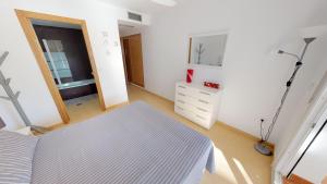 Łóżko lub łóżka w pokoju w obiekcie Casa Kazamour - A Murcia Holiday Rentals Property